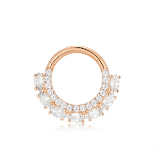 Rose gold nose ring with clear gemstones on a white background