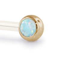 A 14 Gauge side gem in Yellow Gold with a White Opal Cabochon
