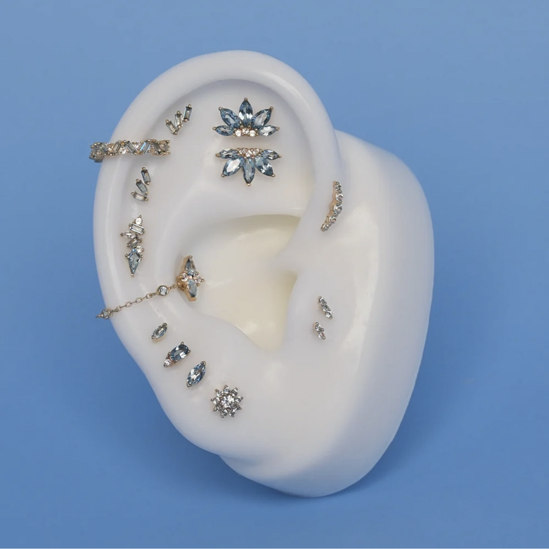 Mishka Three Prong with London Blue Topaz — Buddha