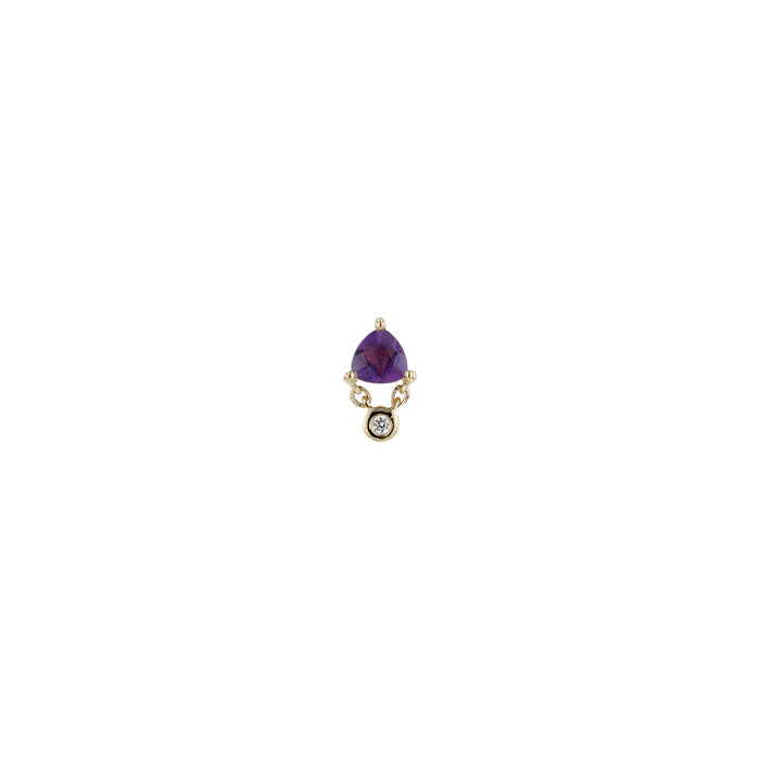 Jewelry with a purple gemstone and gold accents on a white background