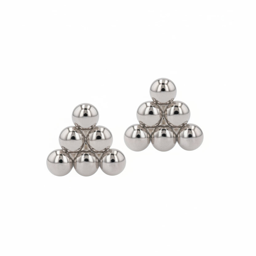 Pair of silver stud earrings on a white background