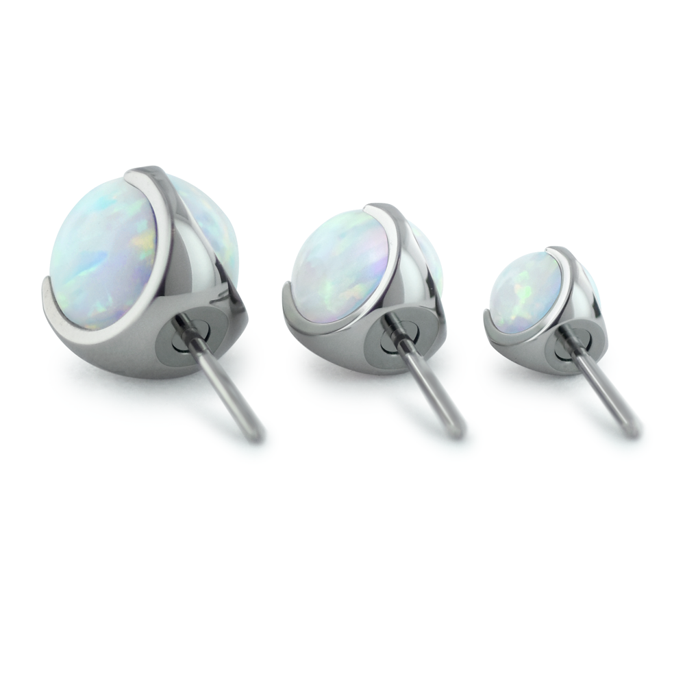 Titanium pin in the back of the white opal sphere end